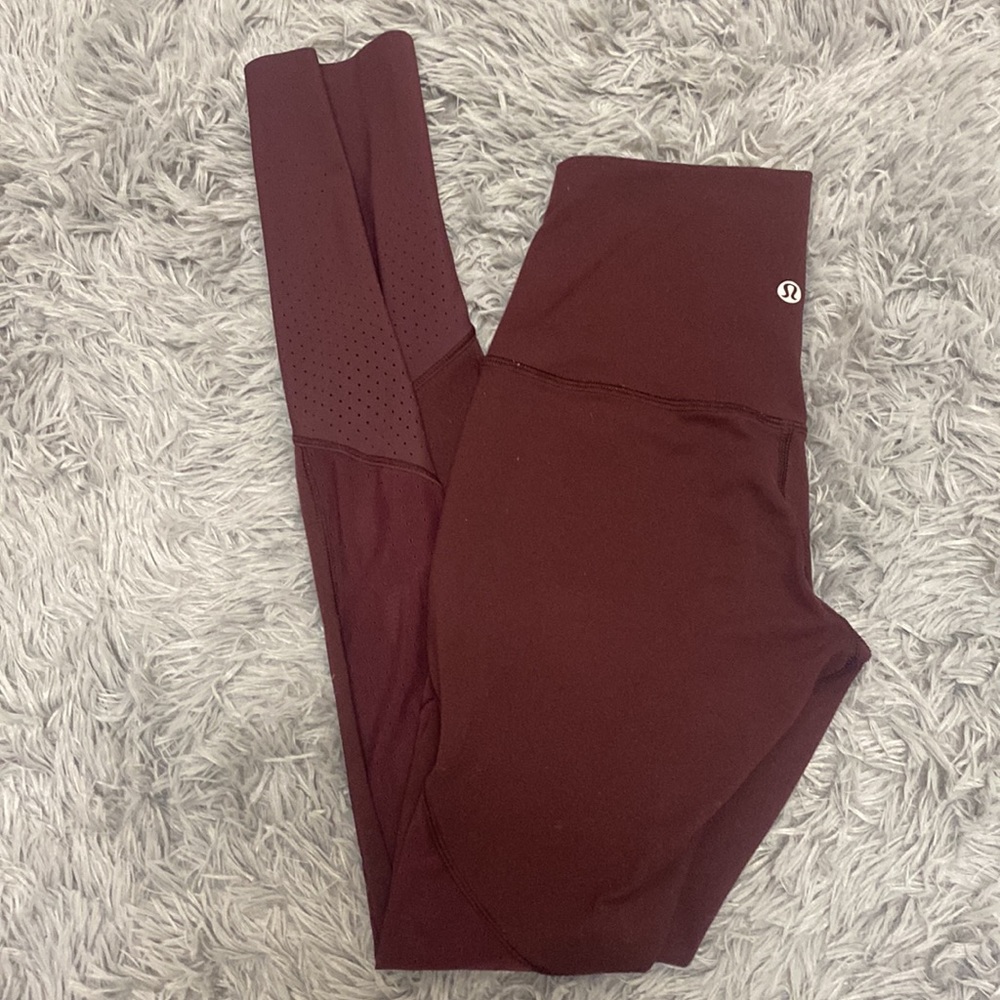 Lululemon activewear perforated front pockets legging high rise